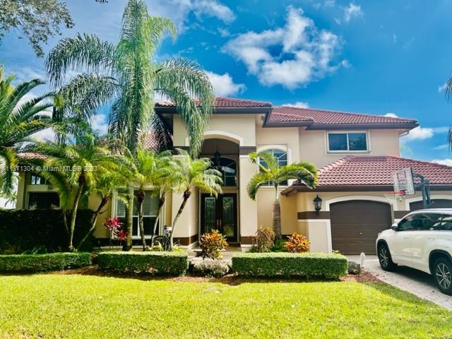 Experience luxury in this 5BR/4BA home in the prestigious Grand Palms Golf Community. Nestled on a private lot, this home features soaring ceilings, 24" marble floors on the 1st floor, and mahogany wood floors upstairs. The gourmet kitchen boasts cherry cabinets and stainless appliances. The 1st-floor primary bedroom includes an ensuite.
Grand Palms is a gated community in Pembroke Pines, known for its golf courses, lush landscaping, and excellent amenities. Nearby shopping, dining, and entertainment options add to the appeal.