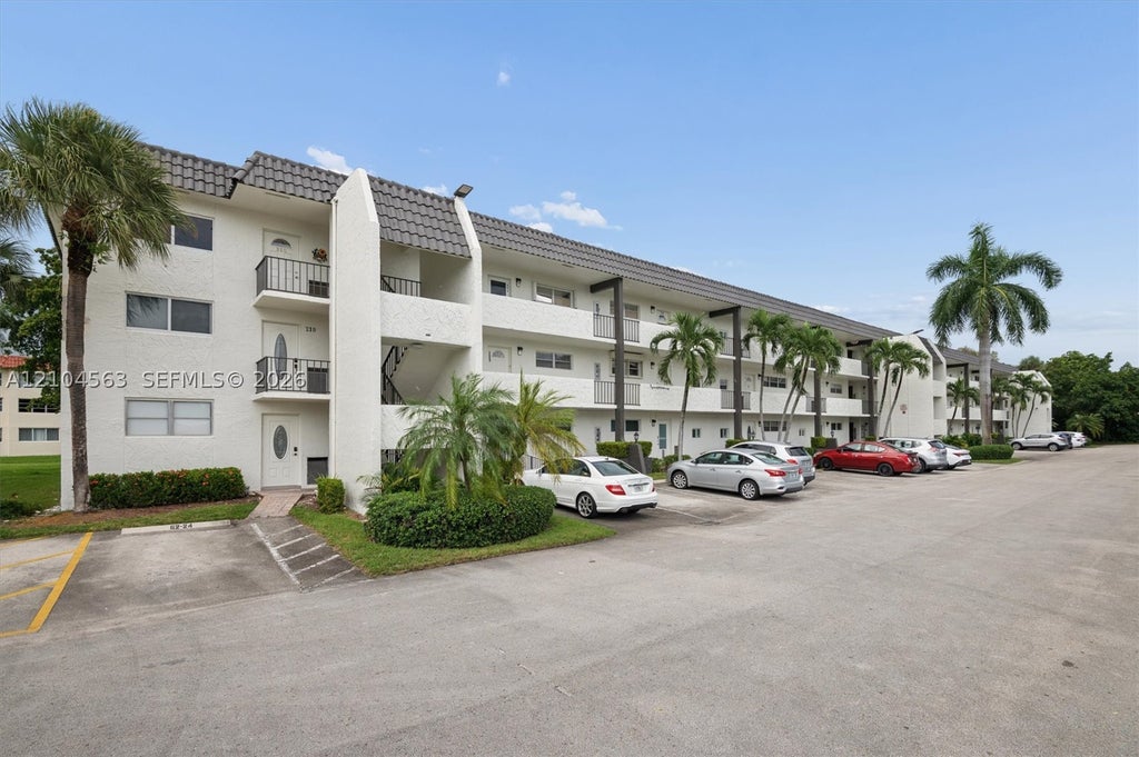 Photo of 8911 S Hollybrook Blvd #310, Pembroke Pines, FL 33025 (MLS # A12104563)