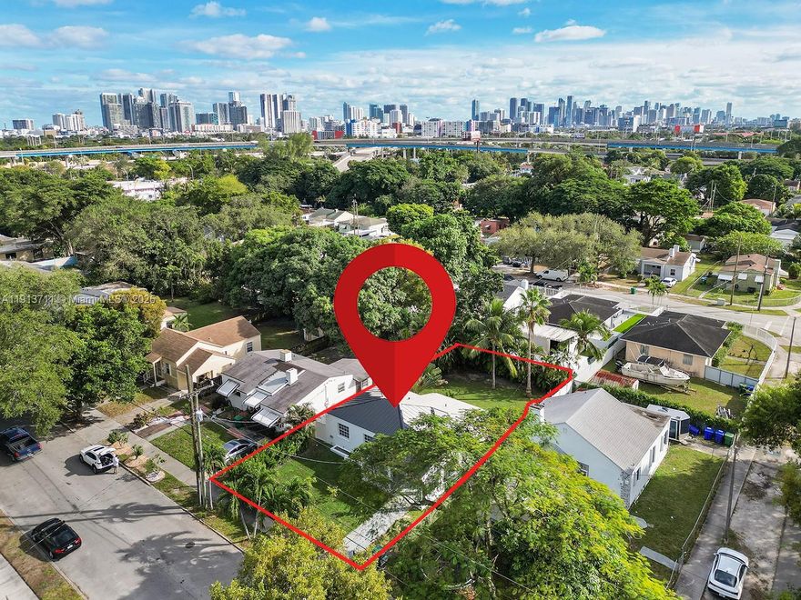 Let the orange, mango, lime and lemon trees welcome you into Casita Arbolita in Miami's fasting growing neighborhood of Model City. This 1,020 sq ft 2 bedroom and 1 bathroom home will shower you in light. Inherit a ton of upgrades to this home with, new AC with new duct work and attic insulation, new appliances in the kitchen and washer/dryer, whole house water filtration system added, upgraded electrical panel and lighting, upgraded interior bathroom, a refreshing outdoor shower and a brand new rear vinyl fence. Maybe a little house, but has a lot to offer in a condition unbeatable to competition.