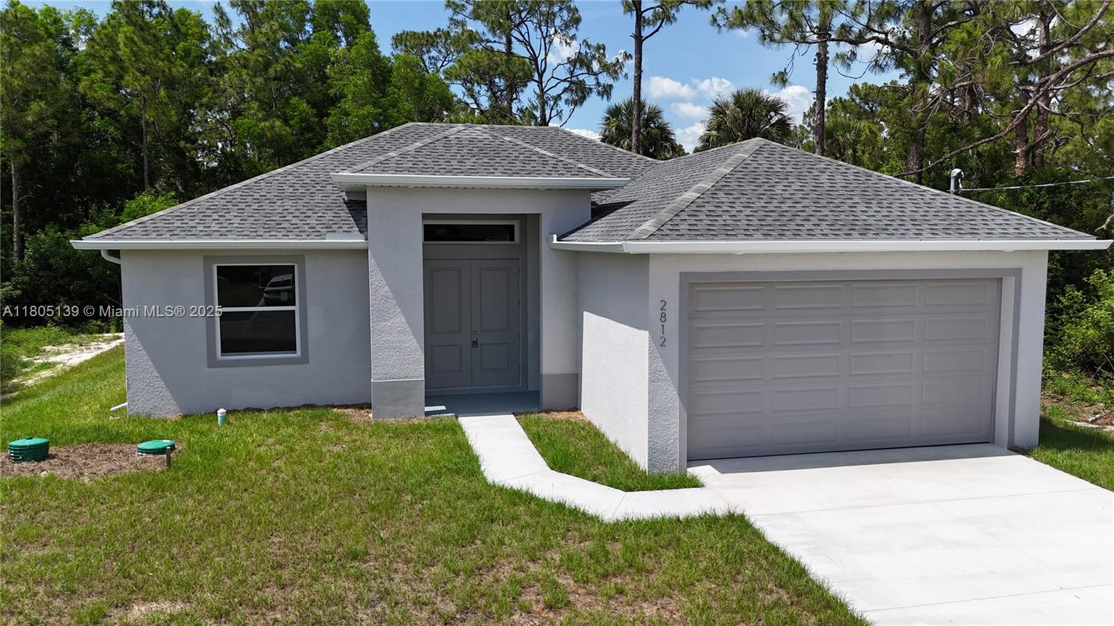 2812 10th St W St, Lehigh Acres, Lee County, Florida - 3 Bedrooms  
3 Bathrooms - 
