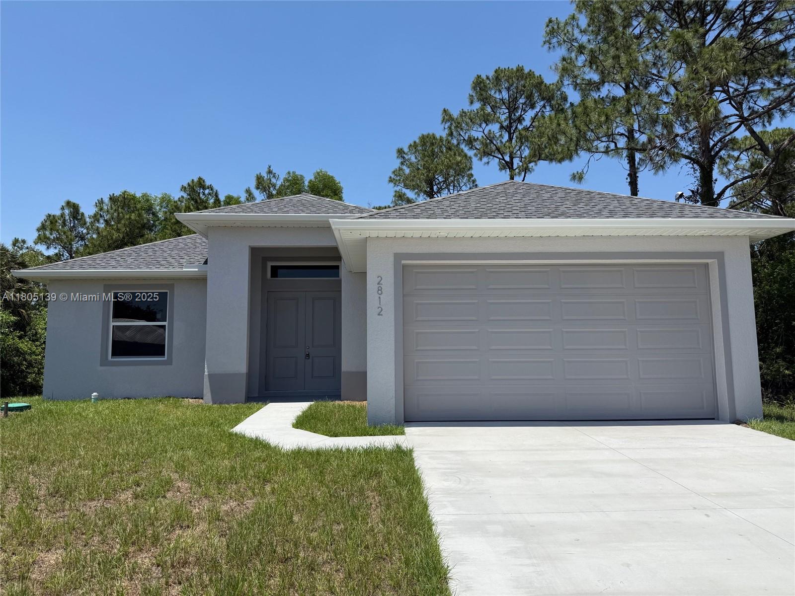 2812 10th St W St, Lehigh Acres, Lee County, Florida - 3 Bedrooms  
3 Bathrooms - 
