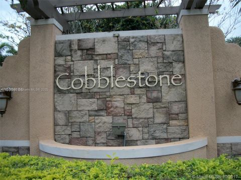 Photo of 14615 SW 14th St #14615, Pembroke Pines, FL 33027 (MLS # A11841545)