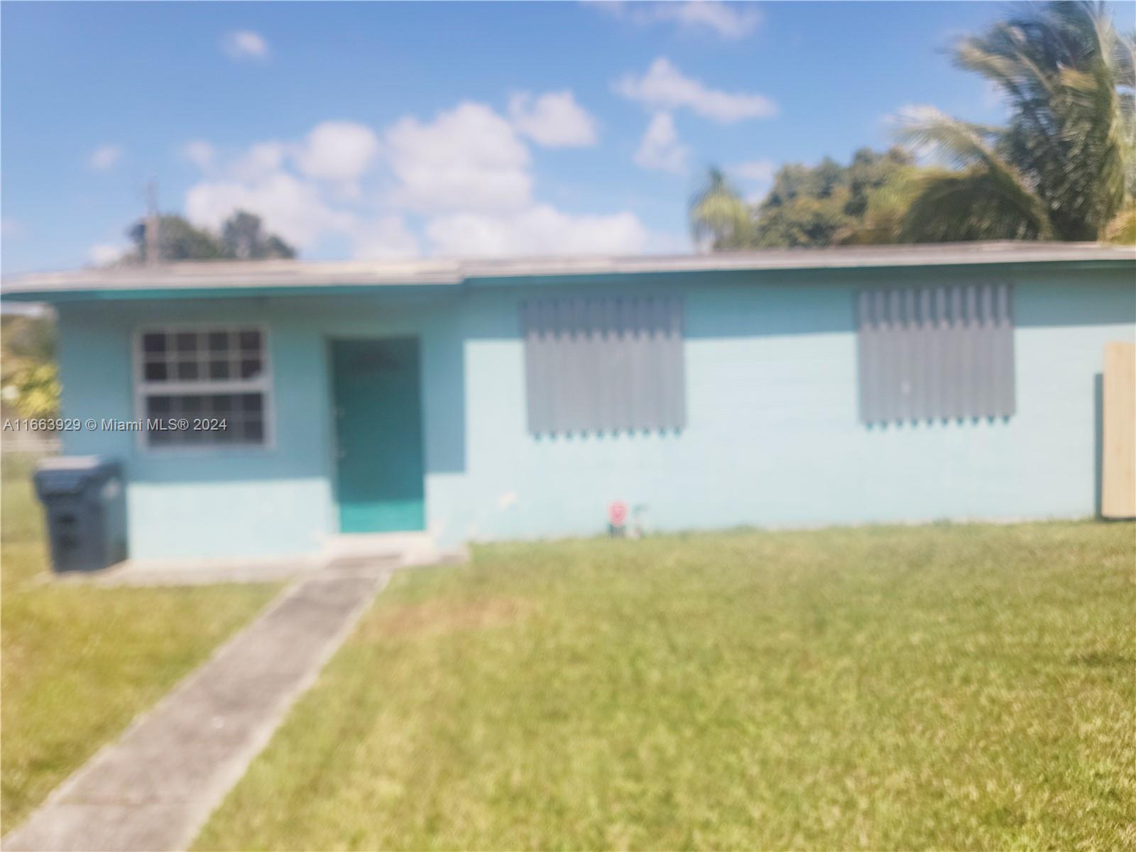 Don't miss this great opportunity to own this beautiful home next to New Construction & high-end communities. The 3-bed, 1-bath home is a secure haven. Inside, Tile and Terrazzo floors & lots of natural light. A beautifully renovated bathroom & spacious laundry room. The fully fenced property features a spacious concrete driveway for boats, RVs & cars. Outside, the expansive yard offers room for a pool. No HOA, this home is perfect as a personal home or investment. Conveniently located off the Turnpike exit, close to Publix, dining, and Black Point Marina. Move-in-ready for a lifestyle of comfort & accessibility! Lot Sq Footage larger than the tax roll; actual lot sq footage 6,510 sq ft.