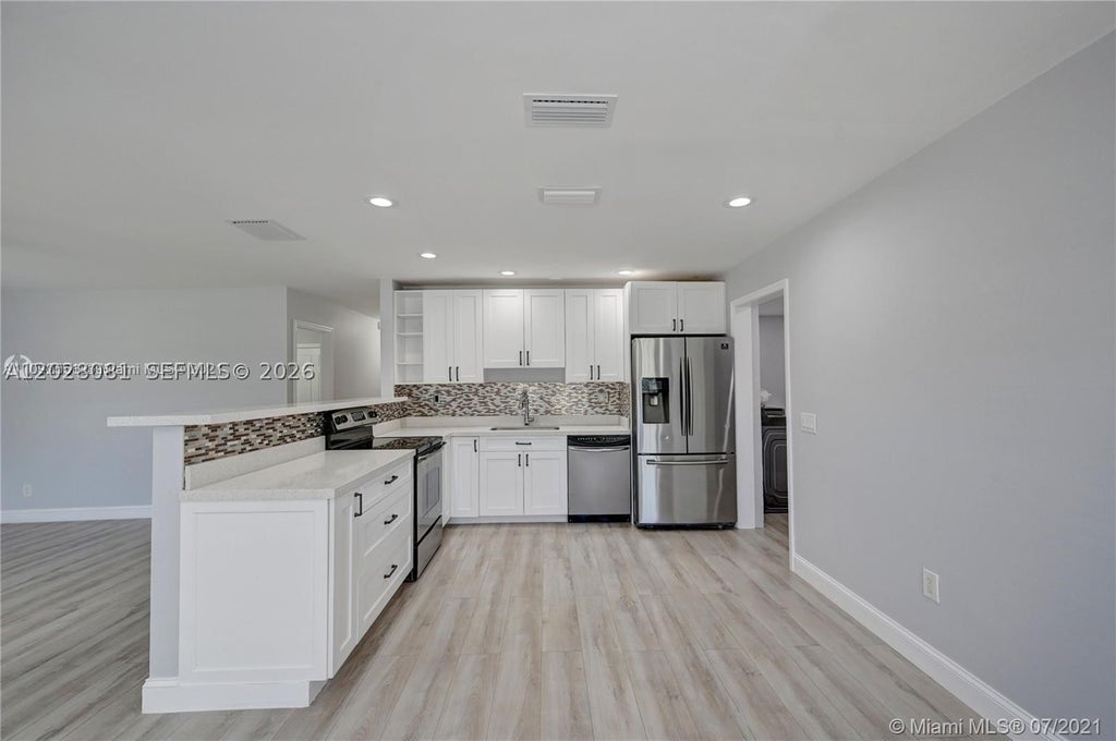Photo of 3673 W Valley Green Dr #42, Davie, FL 33328 (MLS # A12028081)