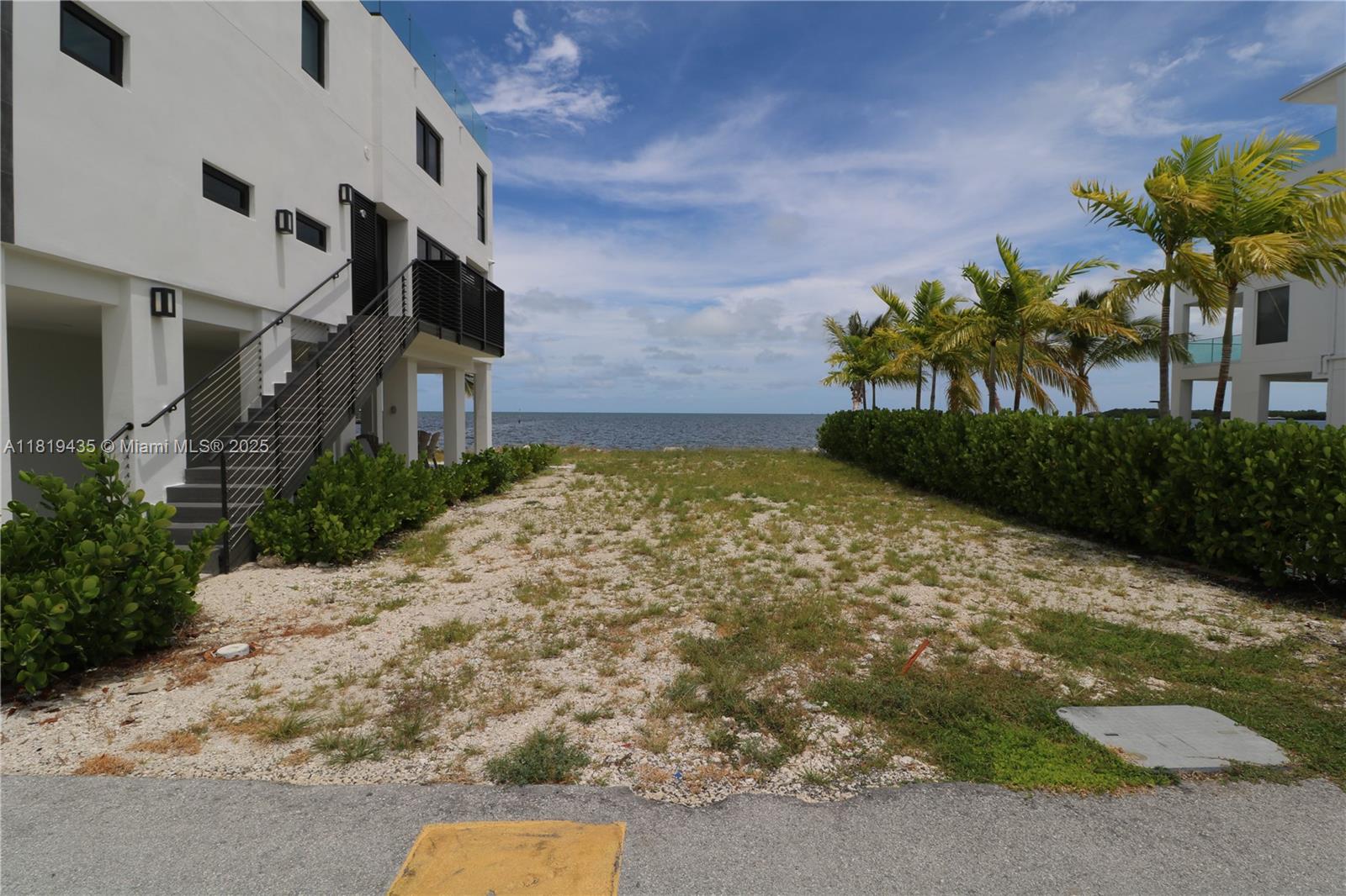 Seize the coveted waterfront opportunity at Key Largo Ocean Resort – One of the remaining oceanfront vacant lots. Embrace direct ocean access in this exclusive gated community and build your dream residence. Indulge in world-class amenities, including a marina, clubhouse, pools, gym, tennis, and basketball courts. Key Largo Ocean Resort epitomizes luxury waterfront living with its comprehensive resort-style offerings. Don't miss this extraordinary chance to own a piece of paradise. Craft an architectural masterpiece tailored to your desires on this rare oceanfront vacant land. Unrivaled waterfront splendor and amenities converge, presenting an opportunity of a lifetime. Act now before it's gone.