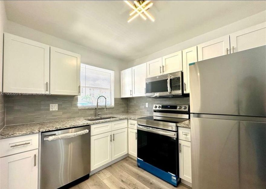 This 1-bedroom, 1.5-bath condo in a 55+ community is a must-see! The unit has been completely remodeled with new flooring, modern lighting, and an updated kitchen featuring new appliances and countertops. Both bathrooms have been tastefully updated, offering a clean and fresh look throughout. A covered sunroom extends the living space, perfect for relaxing or enjoying the garden and pool views. The community offers three heated pools, pickleball and tennis courts, a BBQ area, and a clubhouse/rec room — all just minutes from restaurants and shopping plazas.