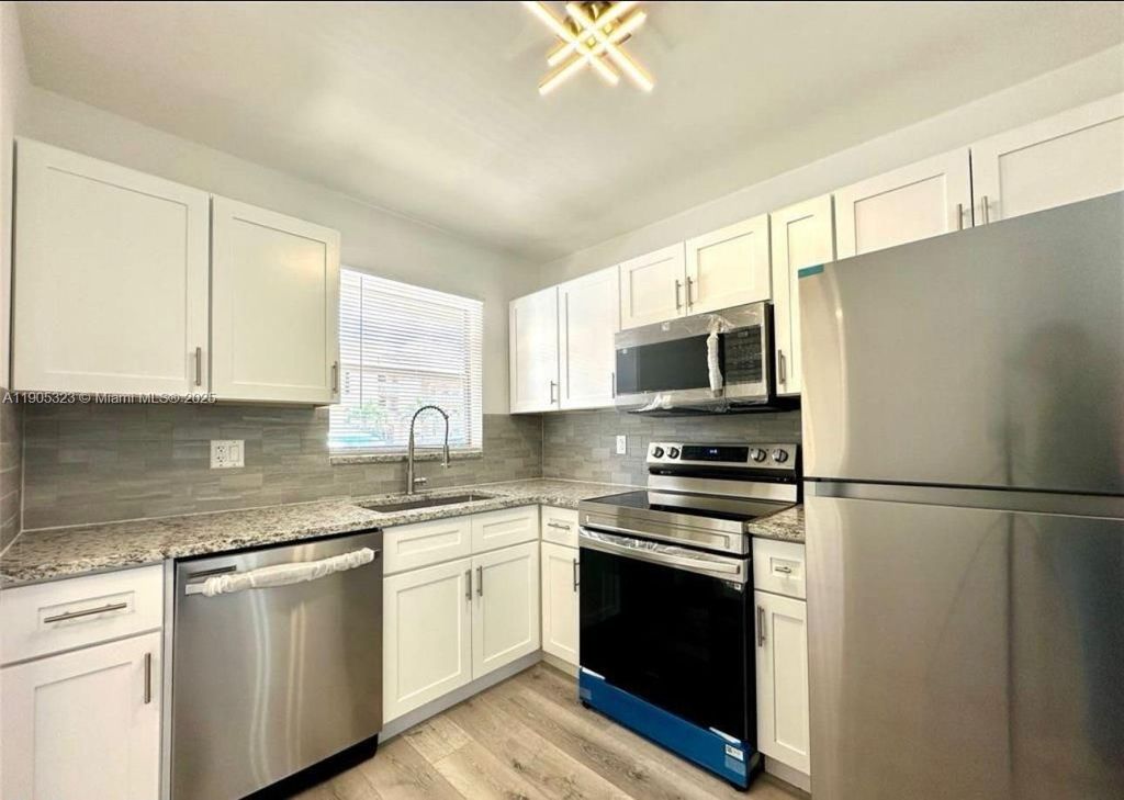 Photo of 6750 Royal Palm Blvd #110E, Margate, FL 33063 (MLS # A11905323)