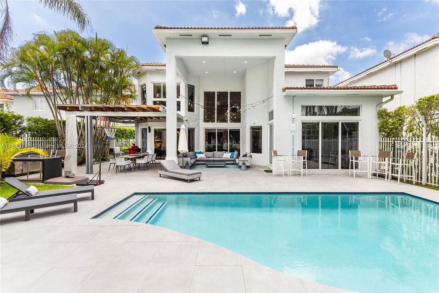 Welcome to a home filled with warmth, natural light, and joyous moments. This stunning residence has been thoughtfully updated to offer a truly exceptional living experience. The remodeled kitchen sets the stage for culinary delights. Step outside to discover a meticulously maintained oasis, complete with a dedicated sprinkler system for the orchids, creating a vibrant and colorful outdoor space. The former garage has been transformed 
room featuring Murphy bed, new flooring, and ample storage.This property is ideally located just minutes from I95, surrounded by a wealth of public and private schools, making it an ideal haven for families seeking convenience and a welcoming community. All windows have been updated to Hurricane Proof windows. And Did I Say it's a GARLAND