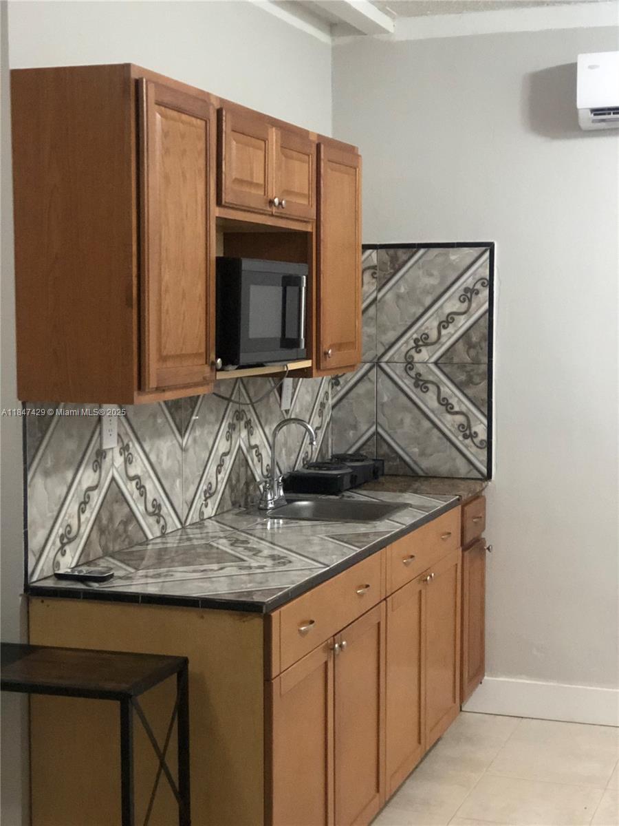 Do not miss this opportunity to enjoy life in a quiet, beautiful efficiency with utilities included, separate entrance, and one car parking space. One person only. Call Listing Agent for more information. Very nice place in a good location. Close to highways, shopping, dining, and much more.