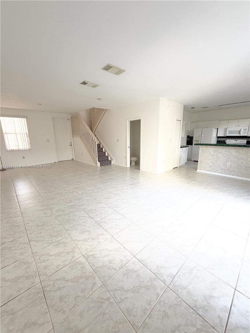 Photo of 13485 NW 9th Ct, Pembroke Pines, FL 33028 (MLS # A11888498)