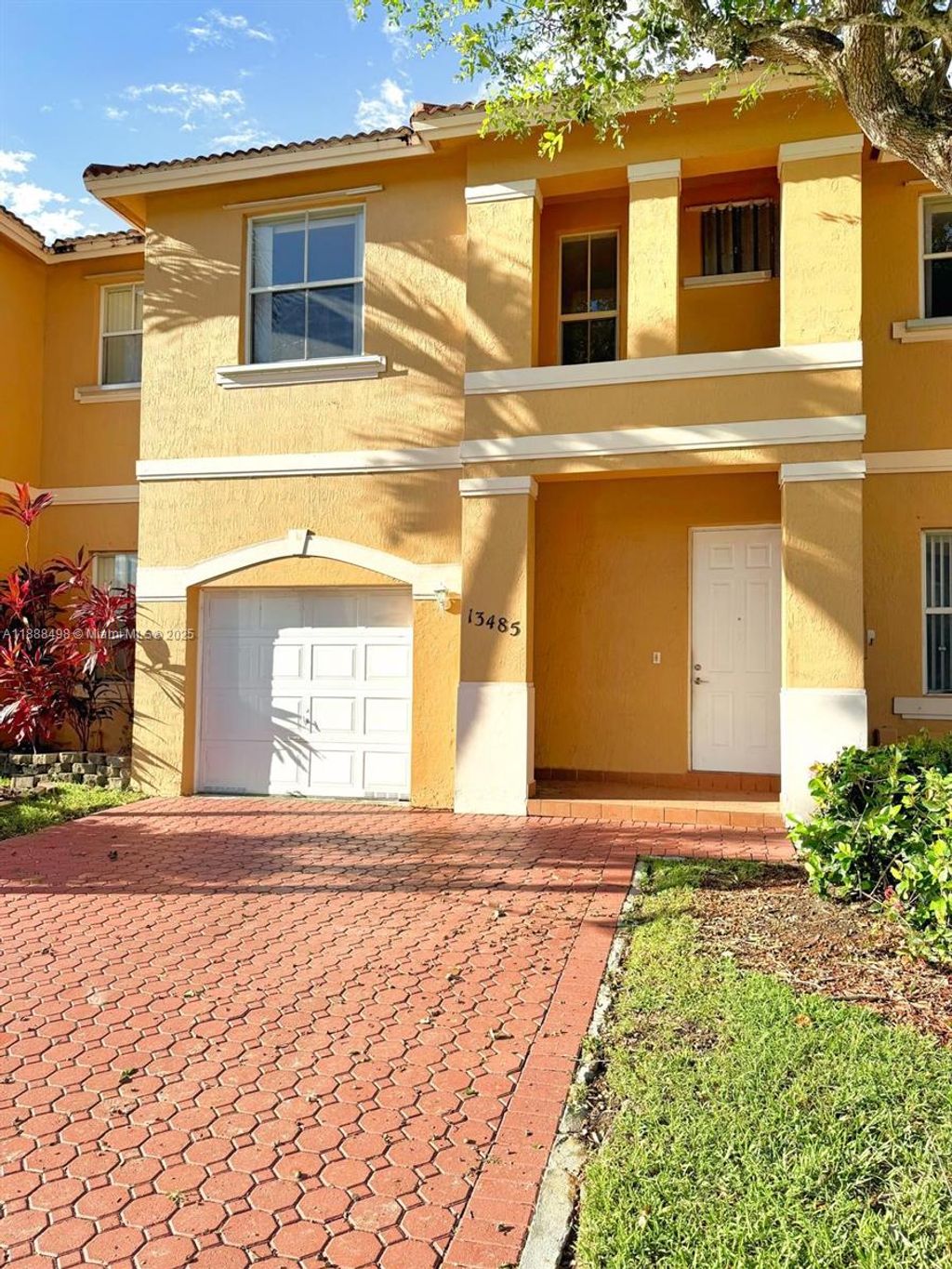 Photo of 13485 NW 9th Ct, Pembroke Pines, FL 33028 (MLS # A11888498)