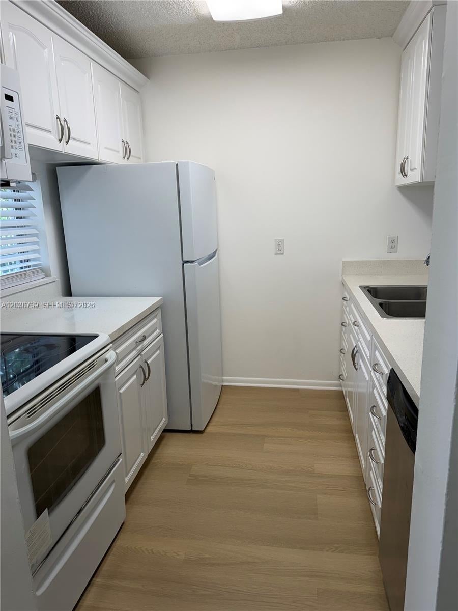 Photo of 8560 N Sherman Cir #404, Miramar, FL 33025 (MLS # A12030739)