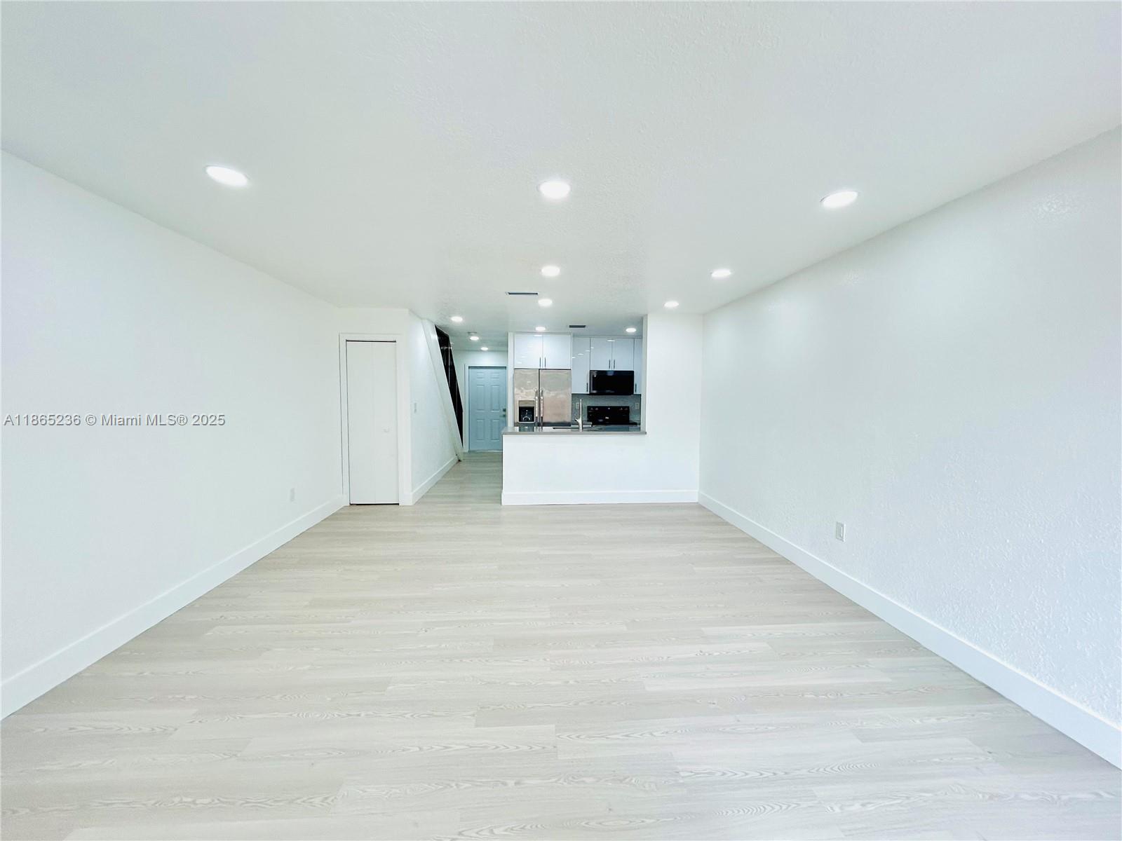 TOTALLY REMODELED 2 bedrooms and 3 full baths CORNER townhouse with excellent location, near to expressways, shoppings and restaurants. Right in the middle of everything in the West of Hialeah. Open concept kitchen with white cabinets, beautiful gray quartz countertops and SS appliances. Modern bathrooms with glass shower doors. Nice pvc laminate, new doors, baseboards and let lighting. Quiet and small community with only 10 homes. NO PETS ALLOWED.