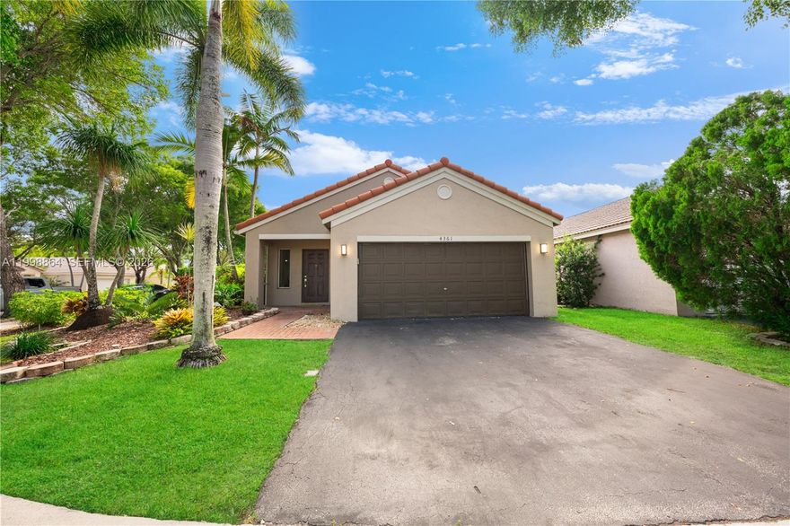 What’s it like living in The Ridges in Weston, FL? It’s one of Weston’s most desirable guard-gated communities, known for its family-friendly atmosphere, beautifully maintained streets, and access to top-rated schools. Welcome to 4361 Mahogany Ridge Drive, perfectly positioned on a prime corner lot with lush landscaping and tropical curb appeal, offering 3 bedrooms and 2 bathrooms designed for comfortable, everyday living. Inside, soaring vaulted ceilings and abundant natural light create a bright, open feel, with multiple living spaces including a formal living room, dining area, and separate family room, ideal for entertaining or relaxing with family. Tile flooring and recessed lighting add a clean, move-in ready touch throughout. The primary suite serves as a private retreat with an updated bathroom and walk-in shower, while the outdoor space offers a peaceful garden setting perfect for weekend BBQs or unwinding in the Florida sunshine. Beyond the home, residents of The Ridges enjoy proximity to scenic parks like Weston Regional Park and Peace Mound Park, along with world-class shopping and dining just minutes away at Sawgrass Mills. With easy access to major highways and everything Weston has to offer, this is more than just a home, it’s the lifestyle buyers have been waiting for.