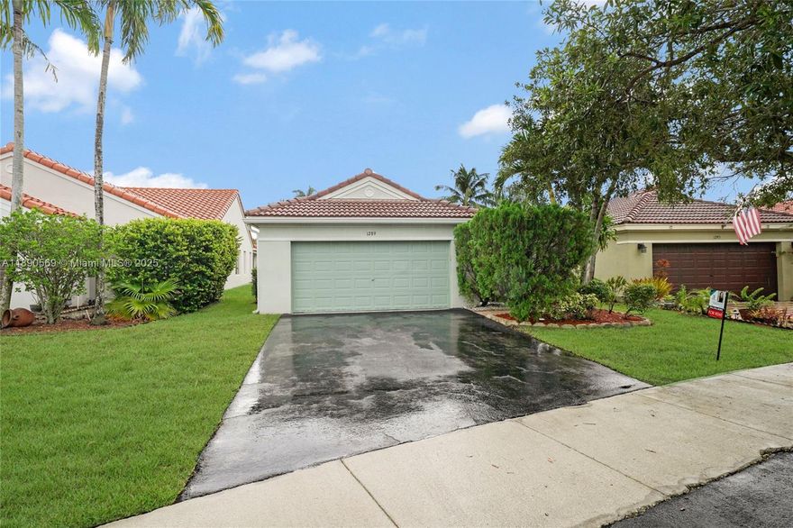 Beautiful 3-bedroom, 2-bath single-family home with lake view in the gated community of Savanna in Weston. Features open living areas, kitchen, stainless steel appliance and granite countertops, spacious bedrooms, and a serene screen patio overlooking the lake—perfect for relaxing or entertaining. Located on a quiet street with 2-car garage. Enjoy resort-style amenities: clubhouse, pools, water slide, mini golf, pickleball, and more. A+ schools, close to shops, dining, and major highways. All A+ schools. Easy approval!