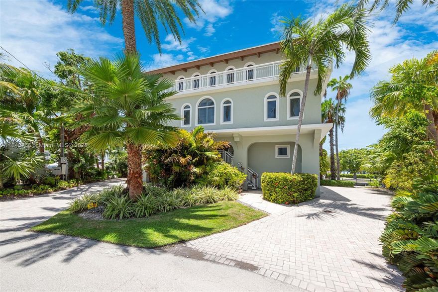 Welcome to this exceptional Port Antigua residence—a boater’s paradise with 135 ft of protected dockage and 3,520 sqft of elegantly crafted living space. This 4-bed, 3.5-bath home is made for comfort, entertaining, and embracing the relaxed Keys lifestyle. The open-concept design is warm and inviting, and the 3rd-floor living area offers bay views that capture Islamorada’s charm. The chef’s kitchen flows into the dining and living areas, keeping you connected. Enjoy two lifts, fish stations, and a tiki hut to unwind. An elevator connects all levels. The community offers a private beach and boat ramp. Live the lifestyle you’ve dreamed of!