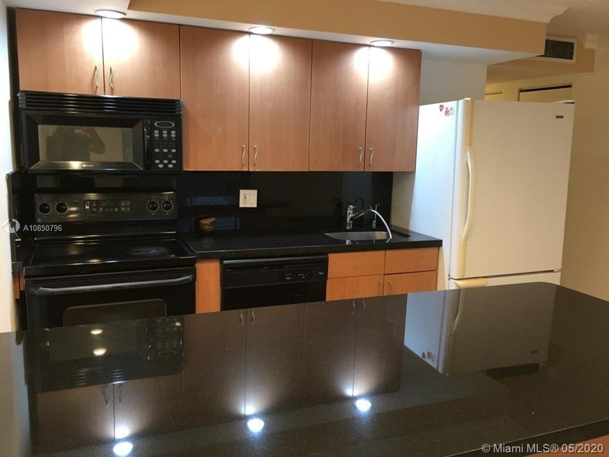The units it's remodeled, Beautiful views. Building amenities include pool, laundry facility and party room.Have one parking space with gate. Walk to the beach and close to school, banks, Publix, shop, etc.
Must to see!!!!!!
