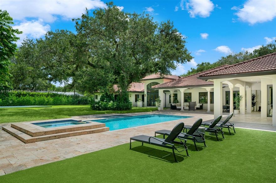 Located on a quiet tree-lined street, the 6-BD, 7.5-BA residence offers a sizable 6,628 SF layout on a beautifully landscaped 36,373 SF lot near Baptist Hospital. Upon entry, one is greeted by triple-height coffered ceilings and plenty of natural light. A gourmet kitchen boasts Taj Mahal quartzite countertops, custom floor-to-ceiling cabinetry, center island, and luxury appliances including a 6-burner industrial Wolf gas stove. Additional features include an insulated 3-car garage with epoxy flooring and AC, impact windows/doors, whole house generator, insulated attic, and Savant smart home system. The beautiful backyard offers a new cabana with full bath, wet bar, recreation room, a sparkling saltwater pool w/waterfall jacuzzi, pickleball/basketball court, and playground area with turf.
