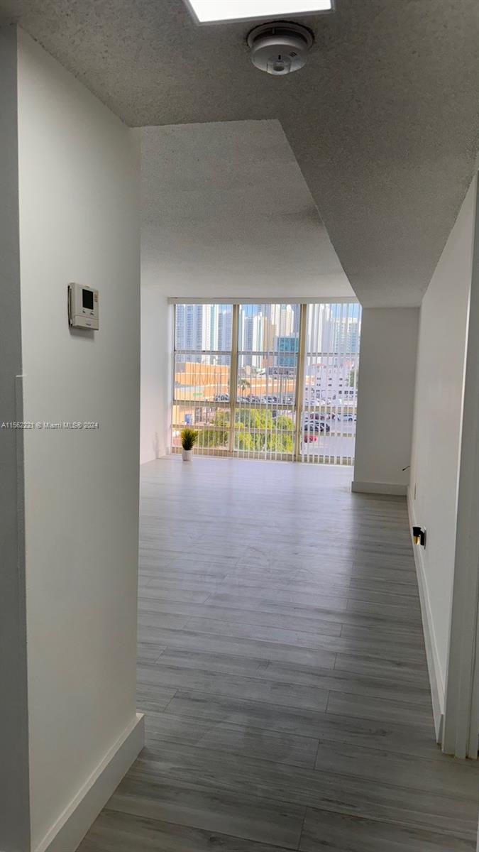 Exquisite unit located in the heart of Sunny Isles Beach. This cozy and luminous apartment has been totally remodeled with new floors throughout, new appliances in kitchen, LED ceiling lamps in all ambiances, new blinds, new closets and pantry. The bathroom was upgraded with a new toilet, new vanity and LED lamps. Assigned parking, guest parking and storage. Amenities: community pool, meeting room, gym, laundry in each floor, onsite management and video surveillance. A few steps to Collins Ave, plazas, entertainment, parks and the exclusive beaches of Sunny Isles. The most beautiful unit in the best location at the best price!