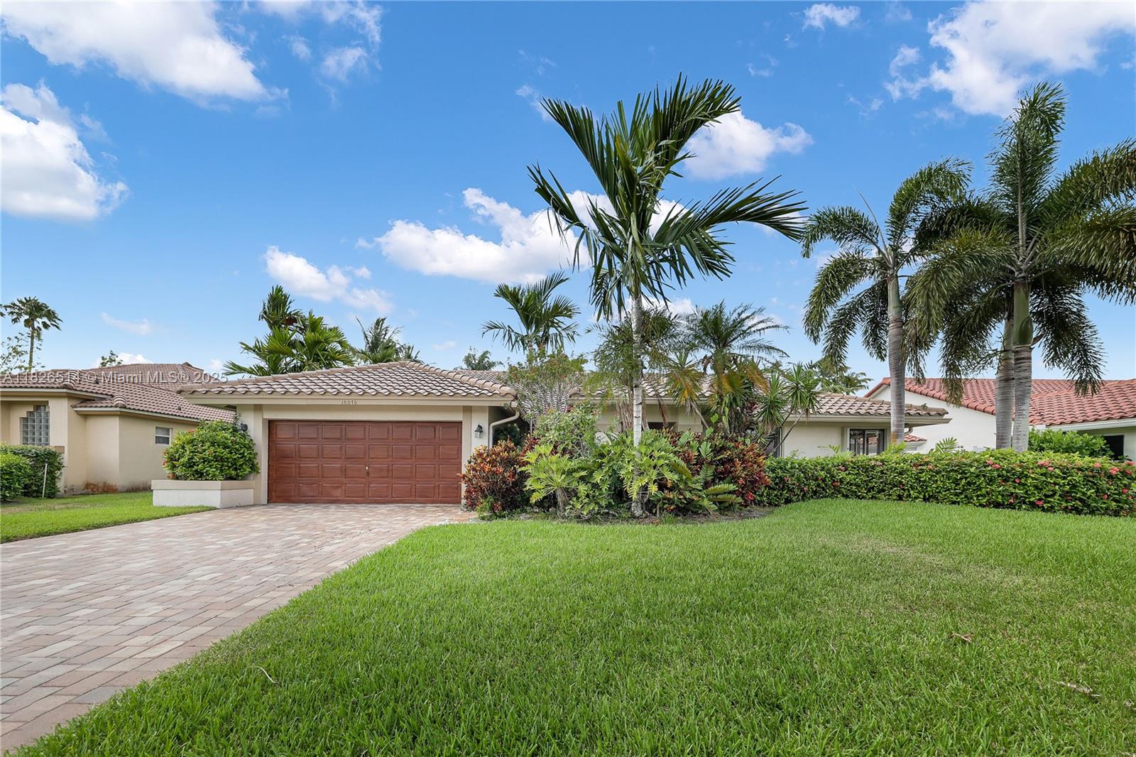 Welcome to this stunning 4-bedroom, 2.5-bath lakefront home in the highly sought-after Plantation community of Jacaranda Lakes. From the moment you walk in, you’ll feel the openness and spaciousness that make this home truly special. Featuring vaulted ceilings, an open-concept kitchen, large bedrooms with ample closet space, and a 2-car garage, this home checks all the boxes. Step outside to your private lakefront oasis, complete with a screened-in pool—perfect for relaxing or taking a swim on a warm Florida day. This move-in ready home is ideally located near top-rated restaurants, major highways, and more. Don't miss out on this incredible opportunity to own a piece of paradise!