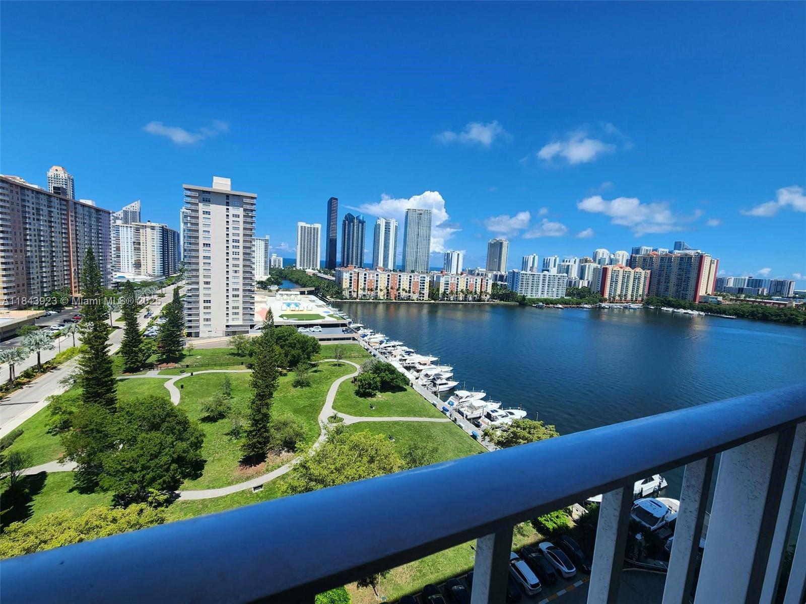 Welcome Home! This oversized, beautifully updated studio offers a prestigious view of Sunny Isles' skyline, Atlantic Ocean/ Bay Views, yachts and greenery. Enjoy the open layout, bright and airy unit with new appliances (yes! washer/dryer INSIDE unit), and modern finishes throughout. The building offers great amenities—gym, beautiful pool area, tennis court, billiard room, assigned covered parking, storage and more!! All just a short walk to the beach.