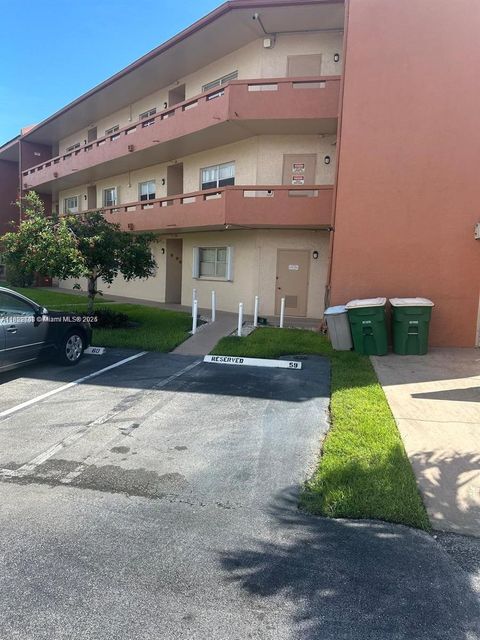 Photo of 8834 W Mcnab Rd #302, Tamarac, FL 33321 (MLS # A11822608)