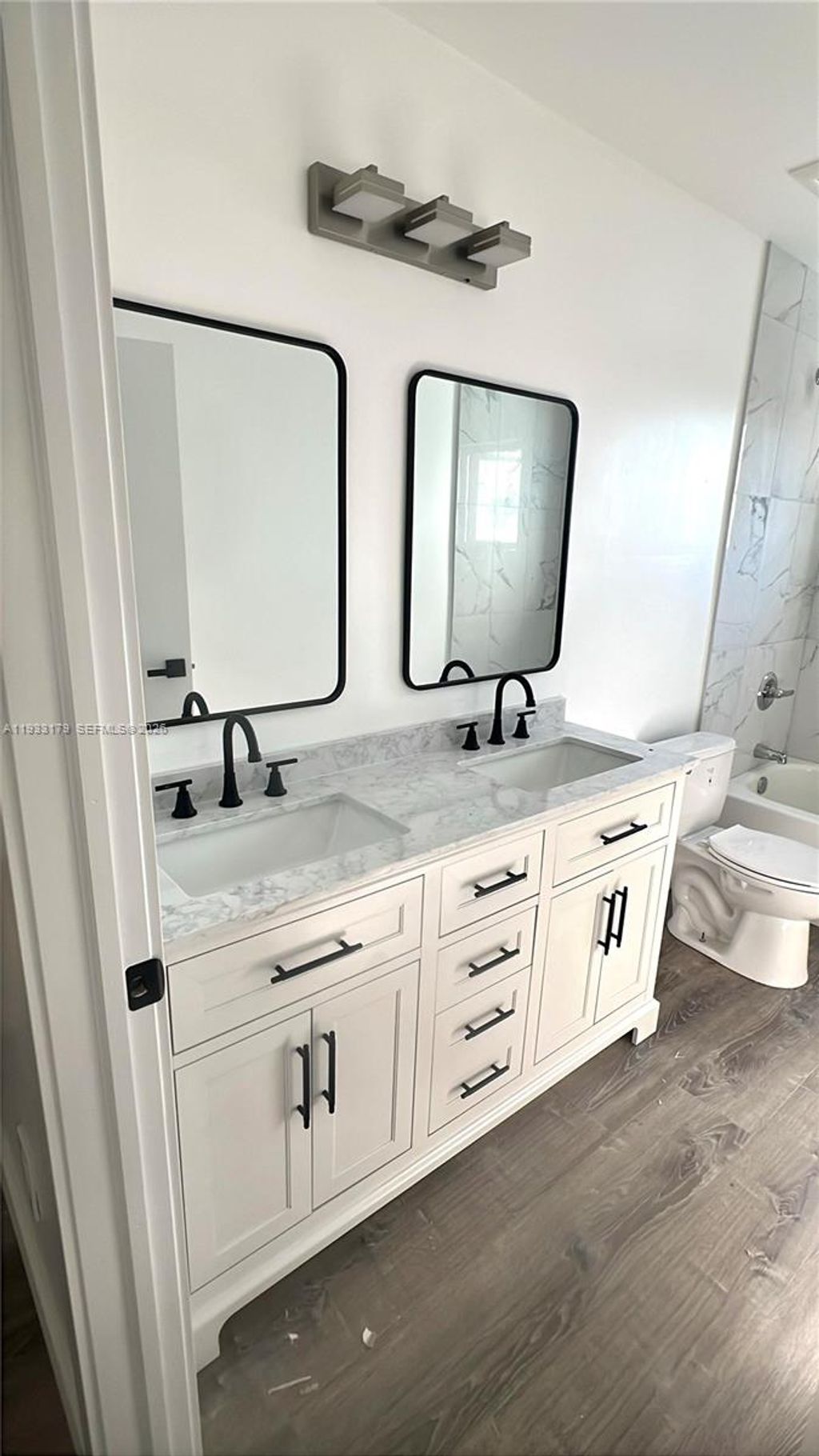 Photo of 1629 NW 40th St, Miami, FL 33142 (MLS # A11933179)