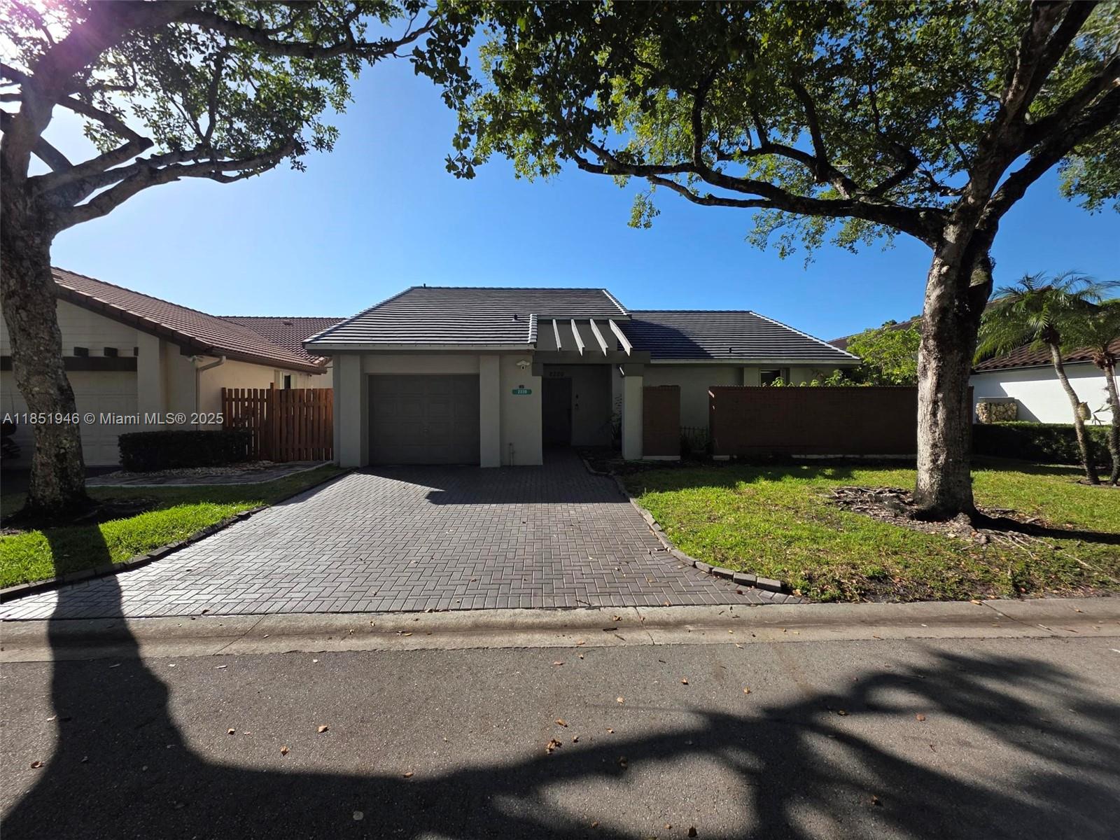 Great Location and Community in Weston!! This 2/2/1 Single Family Rental with a Beautiful Garden Backyard would be perfect for the right Tenant - This home has vaulted Ceilings throughout the Inside and Outside Covered Patio - Tile and Luxury vinyl flooring - Plenty of Storage - Community Pool - Minutes from I75 and I595