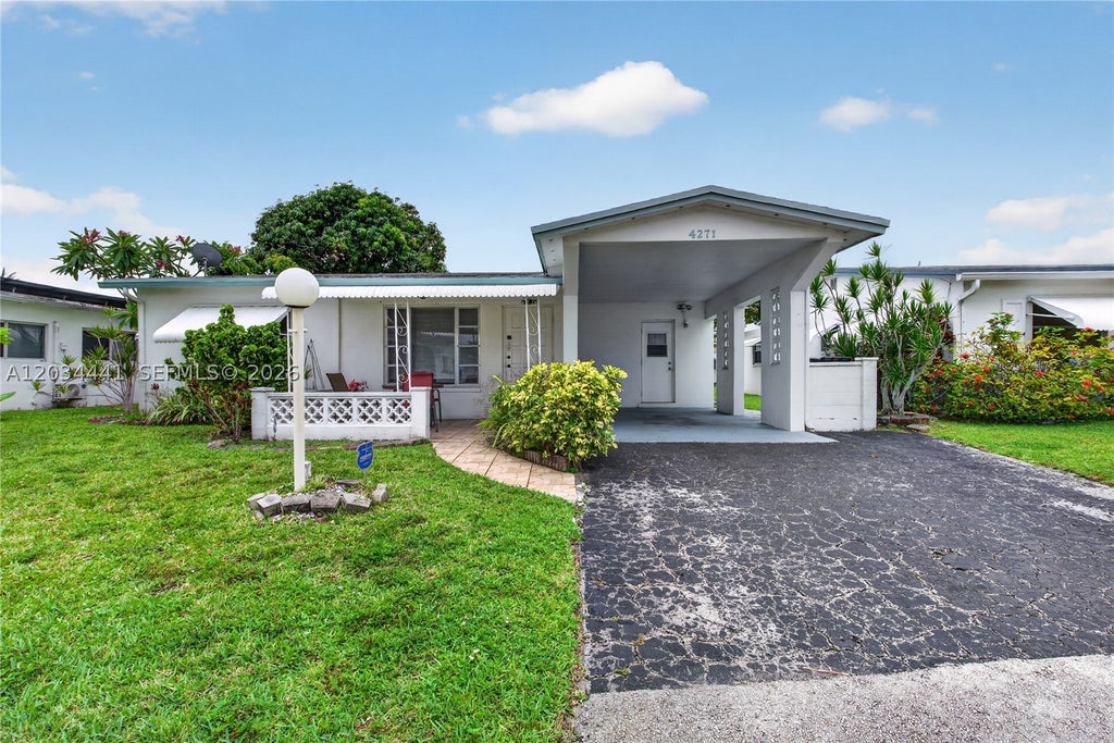 Photo of 4271 NW 49th Ter, Lauderdale Lakes, FL 33319 (MLS # A12034441)
