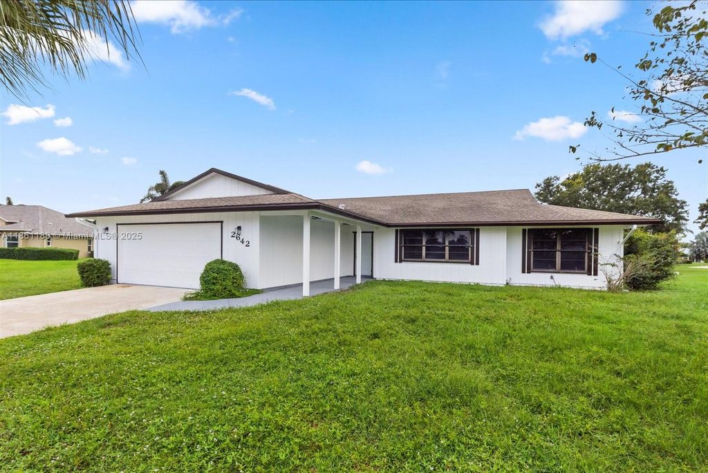 Photo of 2642 SE Emmett Rd, Port St Lucie, FL 34952 (MLS # A11861188)