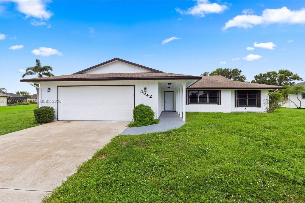 Photo of 2642 SE Emmett Rd, Port St Lucie, FL 34952 (MLS # A11861188)