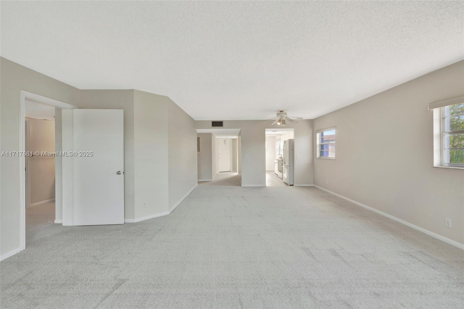 2 bedroom, 2 bathroom corner unit with breathtaking view overlooking the manicured golf course and serene ponds, making it one of the most desirable locations within the community. Located on the 3rd floor offers a charming blend of comfort and accessibility. It features new carpet flooring and is freshly painted, well-maintained a galley kitchen leading into a spacious living/dining area with a breakfast nook. Equipped with a Washer and Dryer inside. Both bedrooms boast walk-in closets, and the entire unit is handicap accessible, ensuring convenience for all residents. Immediate access to the satellite pool right in front of the building further enhances its appeal.