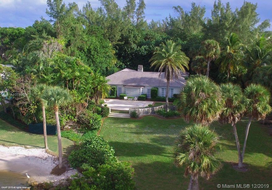 Enjoy panoramic river vistas along with spectacular Florida sunsets over a nature preserve. Its unique location, with more than an acre of land that comes to a point jutting out into the river, presents water views that go on forever to the north and south. Featuring more than 230 feet of shoreline along the Intracoastal Waterway. Build the home of your dreams of up to 7,500 square feet on this amazing Jupiter Island waterfront property!