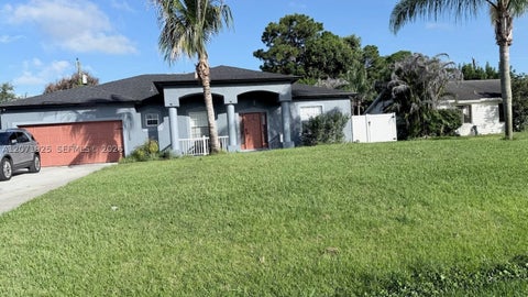 Photo of 1654 SE Holiday Rd, Port St Lucie, FL 34952 (MLS # A12071925)