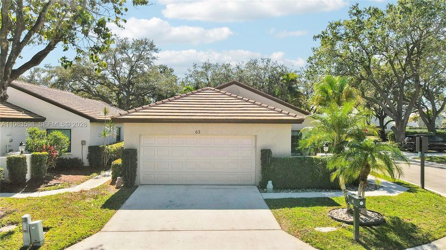 Located within the world famous PGA National Golf Course Community is a special enclave of homes called Ironwood. This beautifully and substantially renovated 3 bedroom 2 bath home located on a corner lot allows for a naturally sun lit exposure  as well as views of the lush Florida landscaping. The house began its transformation in 2017 when a New Roof. HVAC, Fully Renovated Primary and Guest Bathrooms, Nicely Updated Kitchen and Appliances, Ceramic Wood Plank Look Tile throughout etc. were all completed by a high end Interior Designer with exquisite taste and attention to detail. The floor plan of this home offers a large and open Living Room/Dinning Room and a wonderful kitchen with breakfast area as well as 2 spacious guest rooms and a Primary Bed/Bath with double closets and plenty of space to relax and recharge. The Oversized 2 car garage has the laundry area and extra storage. The inviting porch is enclosed and feels like an extension of the house. 2021 New Duct Work, 2024 Full Impact Windows & Doors, 2026 New Hot H2O Heater. This is a must see property for anyone looking to move right in and start enjoying The PGA Lifestyle.
