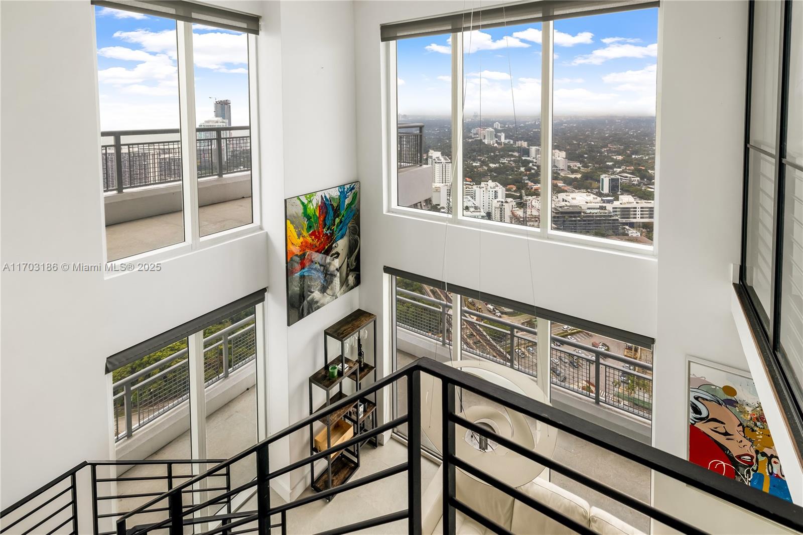 Experience elevated luxury in this stunning two-story corner residence offering breathtaking panoramic views of Miami's skyline, Biscayne Bay, and the Atlantic Ocean from every room. Lots of natural light through floor-to-ceiling windows, the expansive living and dining areas seamlessly blend sophistication and comfort. Situated in a full-service building, residents enjoy resort-style amenities, including a pool, fitness center, valet parking, and 24-hour concierge service, all in the heart of vibrant Brickell.