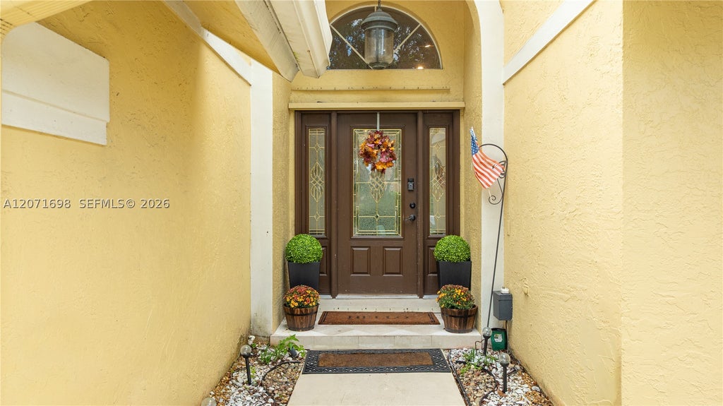 Photo of 7101 NW 44th Ln, Coconut Creek, FL 33073 (MLS # A12071698)