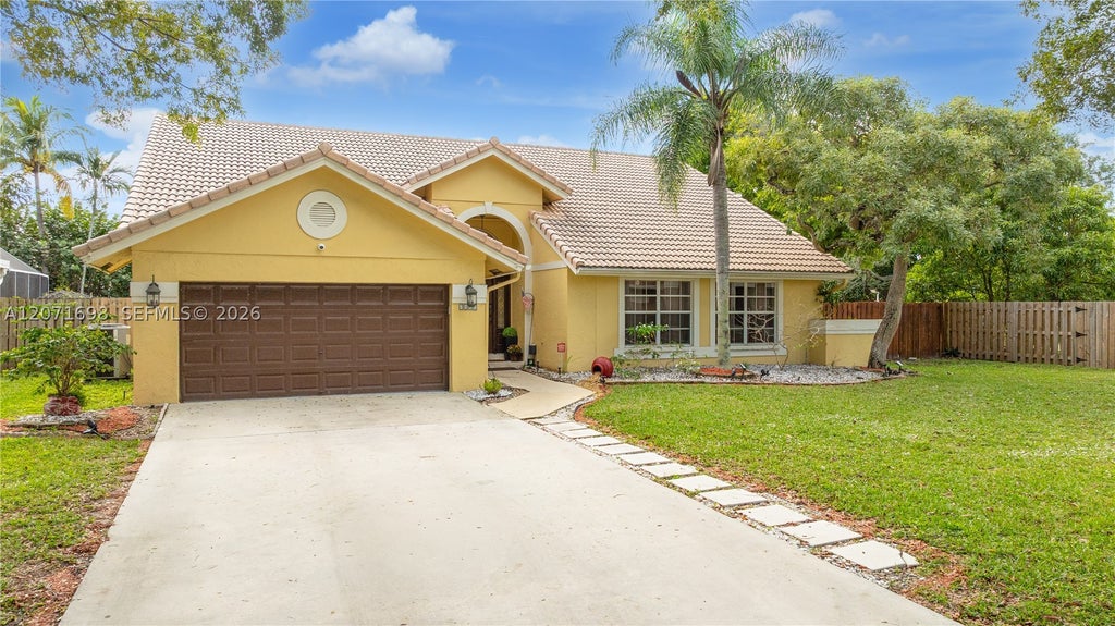 Photo of 7101 NW 44th Ln, Coconut Creek, FL 33073 (MLS # A12071698)