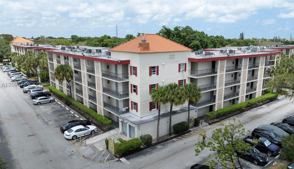 Photo of 3099 NW 48th Ave #157, Lauderdale Lakes, FL 33313 (MLS # A12096769)