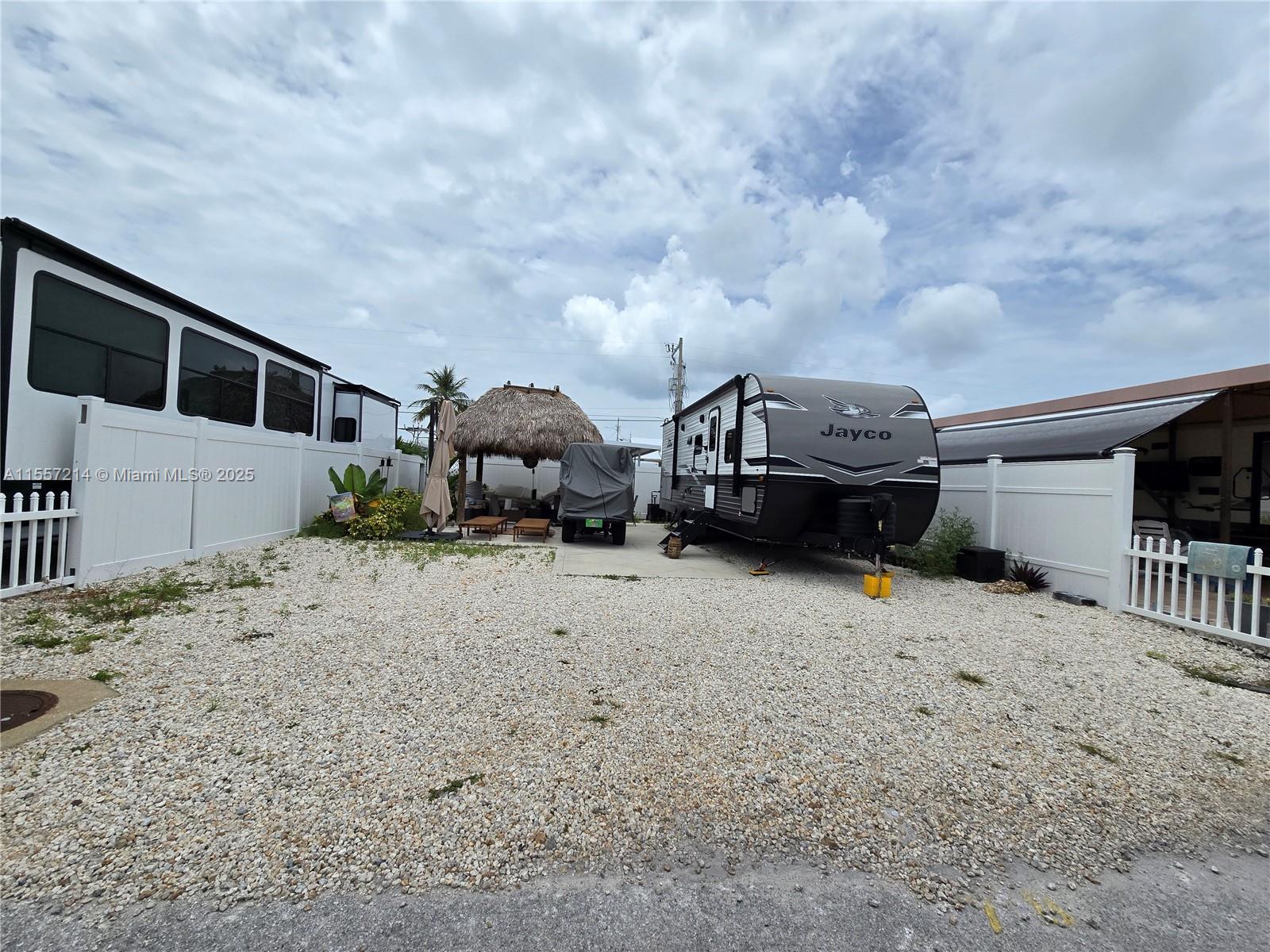 When looking for a vacation place or a place to just enjoy all the keys has to offer. Calusa is the place, here you have it all. Want to go fishing? it has easy water access, vacation friendly and just steps away from the pool. plenty of room to store all your water toys and room for you to park your RV. You may even want to rent it while you are not using and off set your investment cost. Come see it today. Not many empty lots available, one of the few.