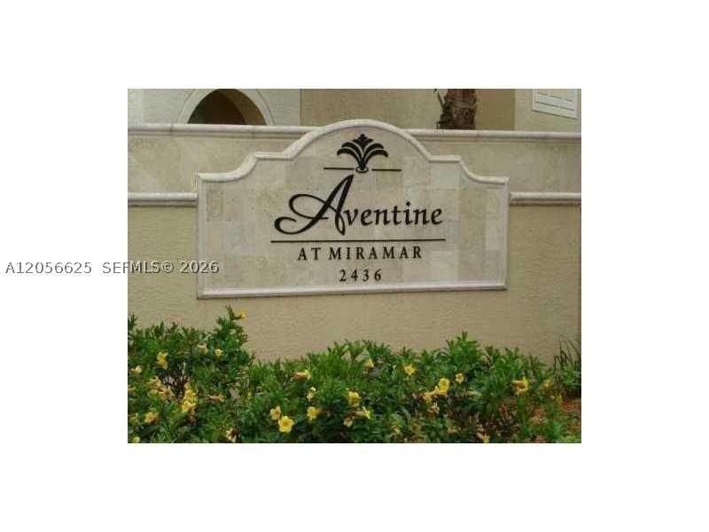 Photo of 2494 Centergate Dr #103, Miramar, FL 33025 (MLS # A12056625)