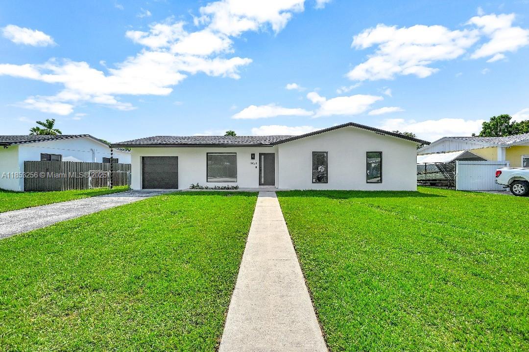 Welcome to your waterfront retreat in Palmetto Bay! This beautifully remodeled 3BD, 2BR canal-front home offers a peaceful escape on a quiet street. The backyard overlooks a serene canal—perfect for fishing or unwinding. Inside, enjoy fully updated interiors, including a gourmet kitchen with sleek cabinetry and stainless steel appliances. The bathrooms have been renovated with contemporary fixtures for a touch of luxury. Additional highlights include a new roof, hurricane impact windows, blinds, and a 1 car garage offering secure parking/extra storage. Conveniently located—easy access to US1, the Turnpike, and 87th Ave, and close to top-rated schools and popular restaurants. Experience the best of Palmetto Bay living—schedule your viewing today!