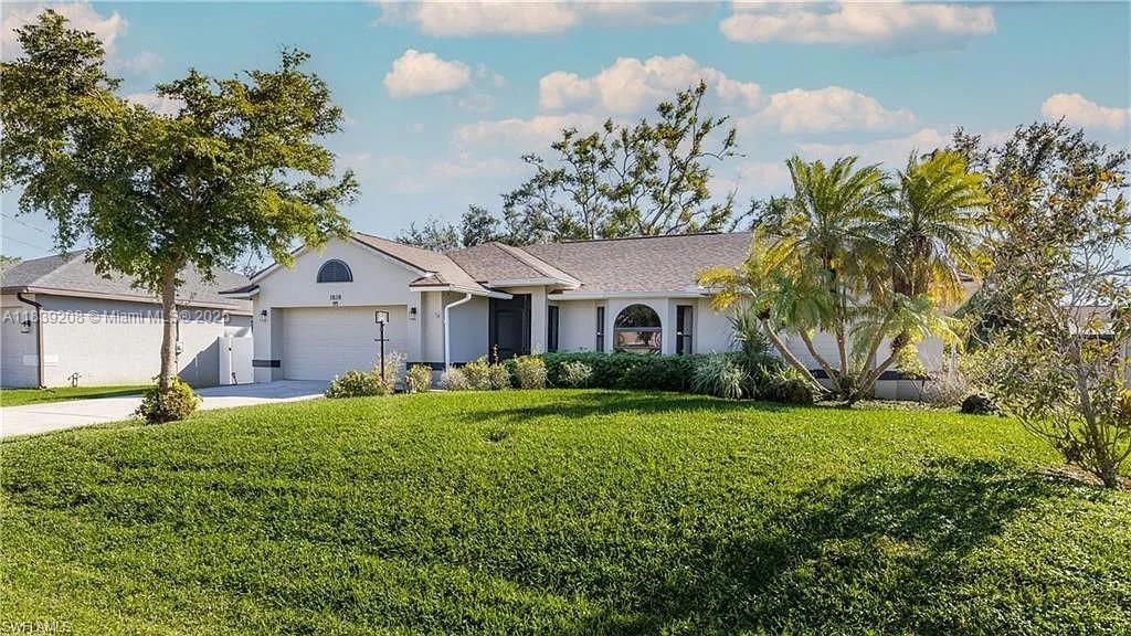 Welcome to 1828 SW 18th Terrace, Cape Coral, where comfort meets opportunity! This stunning residence is the perfect blend of style, warmth, and investment potential. Whether you're searching for a smart addition to your portfolio or a forever family home, this gem checks all the boxes.
Step inside to discover an inviting, open-concept layout enhanced by a custom built-in fireplace, creating a cozy ambiance for relaxing evenings and memorable gatherings. Tastefully partially furnished, the home is move-in ready, offering both convenience and flexibility for your personal touch.
Don’t miss your chance to own this beautifully appointed home that offers both lifestyle and long-term value. Schedule your private tour today!