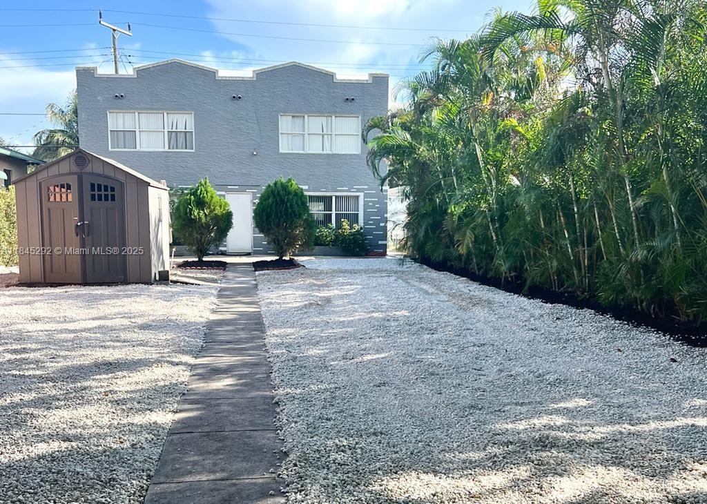 Investor Alert! Prime location just 5 blocks from Downtown Hollywood's Young Circle and 5 minutes to the beach. Triplex includes two 1BD/1BA units upstairs and a spacious 2BD/2BA unit on the first floor. Property is partially furnished and features porcelain tile floors, European-style kitchens, and stainless steel appliances. Zoned for short-term rentals—ideal for Airbnb or seasonal income. First-floor unit can be converted into two 1BD/1BA units, generating up to $21K in additional annual income. Rents are currently below market, creating strong upside potential. Lot allows for up to 10 units—excellent redevelopment opportunity. Live in one and rent the rest, or maximize income as a short-term rental portfolio.