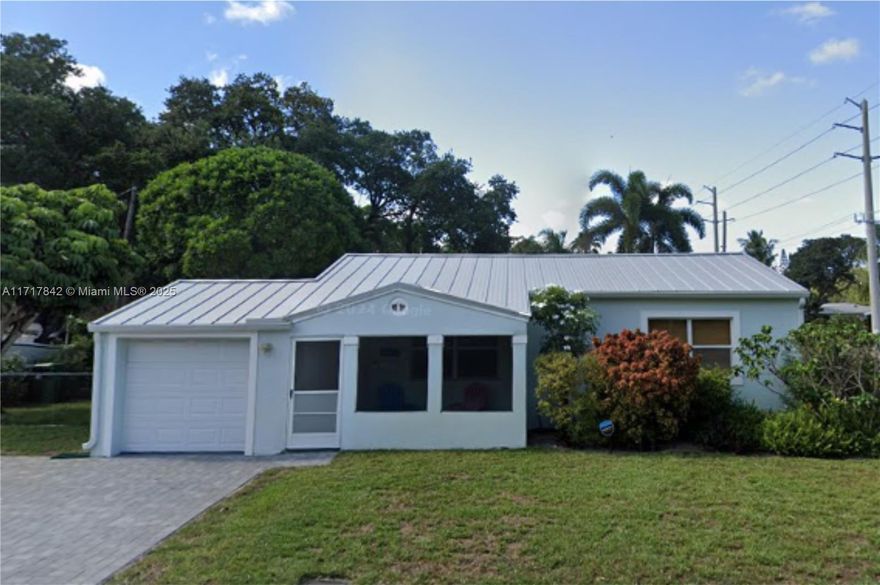 Instant equity here! This home offers a metal roof installed in 2019 and impact windows and doors. The bathroom is newly renovated, while the modern kitchen has pretty granite countertops and stainless steel appliances. It also includes recessed lighting, a surround-sound speaker system, a modern washer and dryer set and a tankless water heater. The fully-fenced yard can accommodate a pool besides the shade trees and garden area. Minutes from major highways, shopping and entertainment, while still surrounded by tree-lined streets. 

INVESTORS: This 2 bed/1 bath home can easily be turned into a 3 bedroom, 2 bath home by converting the air-conditioned garage and adding a bath where there are already water connections. Get in touch for info about the comps.