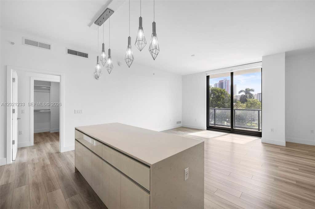 Photo of 101 Diplomat Pkwy #506, Hallandale Beach, FL 33009 (MLS # A12021233)