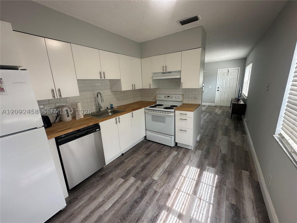 Photo of 3739 SE 15 St #1, Dania Beach, FL 33004 (MLS # A12092458)