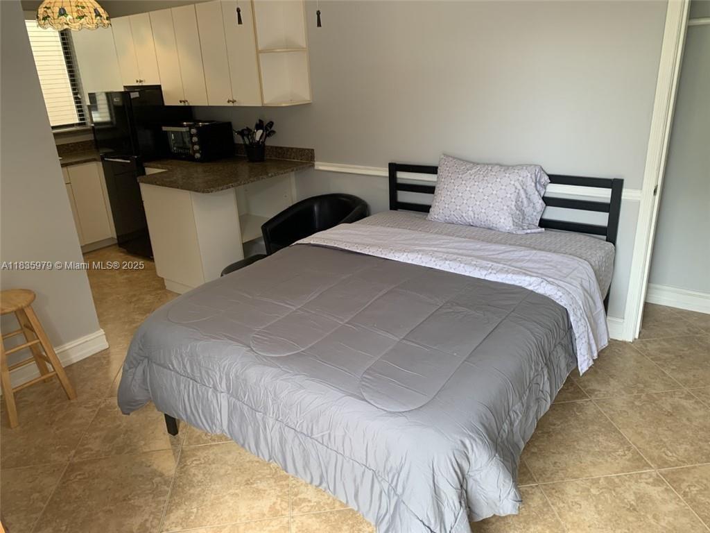 Move-in ready Efficiency! Private entrance only one person can be living in the unit. The lease term is for six months and can be renewed or stayed month to month after the expiration of the lease. The unit comes fully furnished, furniture will not be removed. Furniture included is Tv, Bed, hot plate Microwave, coffee maker, Rent includes Electric, water, Wi-Fi, and cable Window unit A/C. Great location close to Highways, shopping, and entertainment!