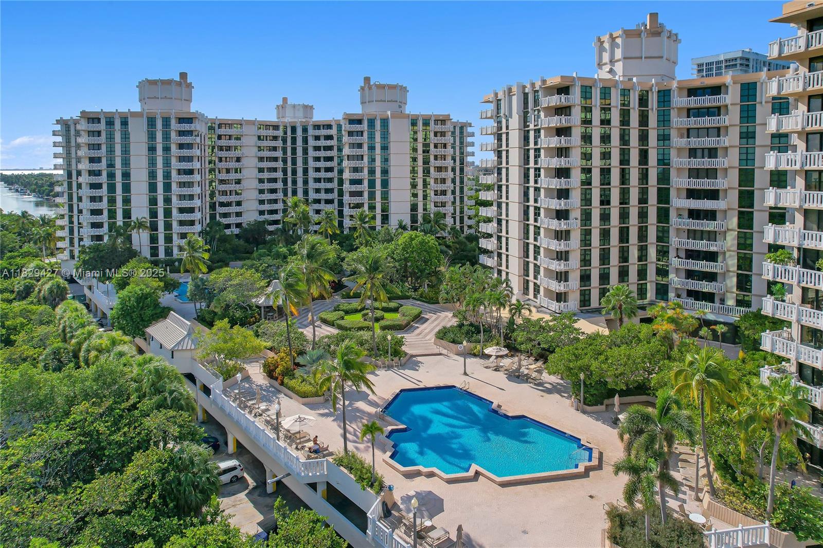 Spaciously designed corner Estoril floor plan 2/2 elegant apartment. Enjoy 1,782 ample square feet of living area. Beautiful apartment with nice size balcony with views of the relaxing & lush Japanese Gardens. Large spaces, lots of closets & storage area. Great natural light enters through floor to ceiling windows. Fabulous condo offers resort style all amenities. These include: heated community pools, private beach with chairs & umbrellas, BBQ area, children playroom, tennis courts, fitness centers, game room, card room, social room, restaurant and more. This precious unit is located on the Village of KB, a secluded & secure island with a unique lifestyle. Great schools!!! Best of island living!