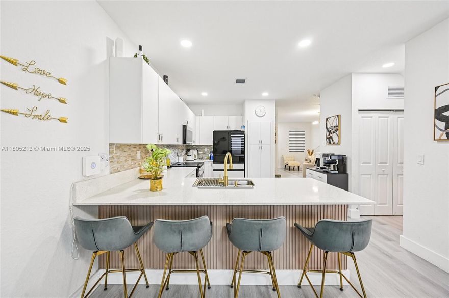 Beautiful 4-bedroom, 2.5-bath townhouse in the desirable Pine Vista community! This stunning home features an open layout with spacious living and dining areas, elegant finishes, and plenty of natural light. The kitchen offers granite countertops and bespoke appliances. Upstairs, enjoy spacious bedrooms including a bright primary suite with a walk-in closet and double-vanity bath. Relax in the private fenced patio, ideal for gatherings or quiet evenings. The community offers a clubhouse, fitness center, and pool. Conveniently located near major highways, schools, and shopping. Move-in ready!